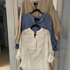 Three pack of women’s linen tunics… white, tan, blue